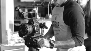 man holding video camera
