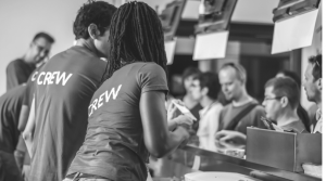 crew helping customers at event