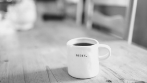 mug with BEGIN on it
