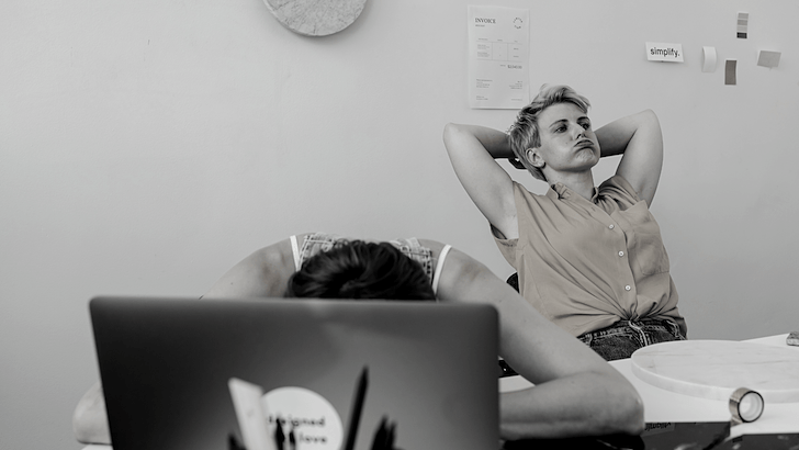 team looking tired and stressed with work