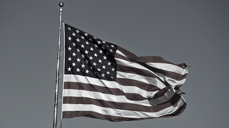 us flag blowing in wind